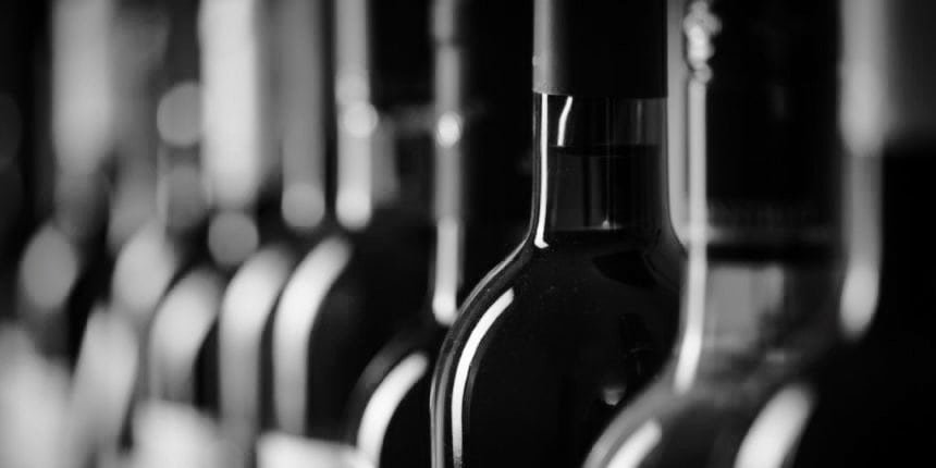 A row of wine bottles.